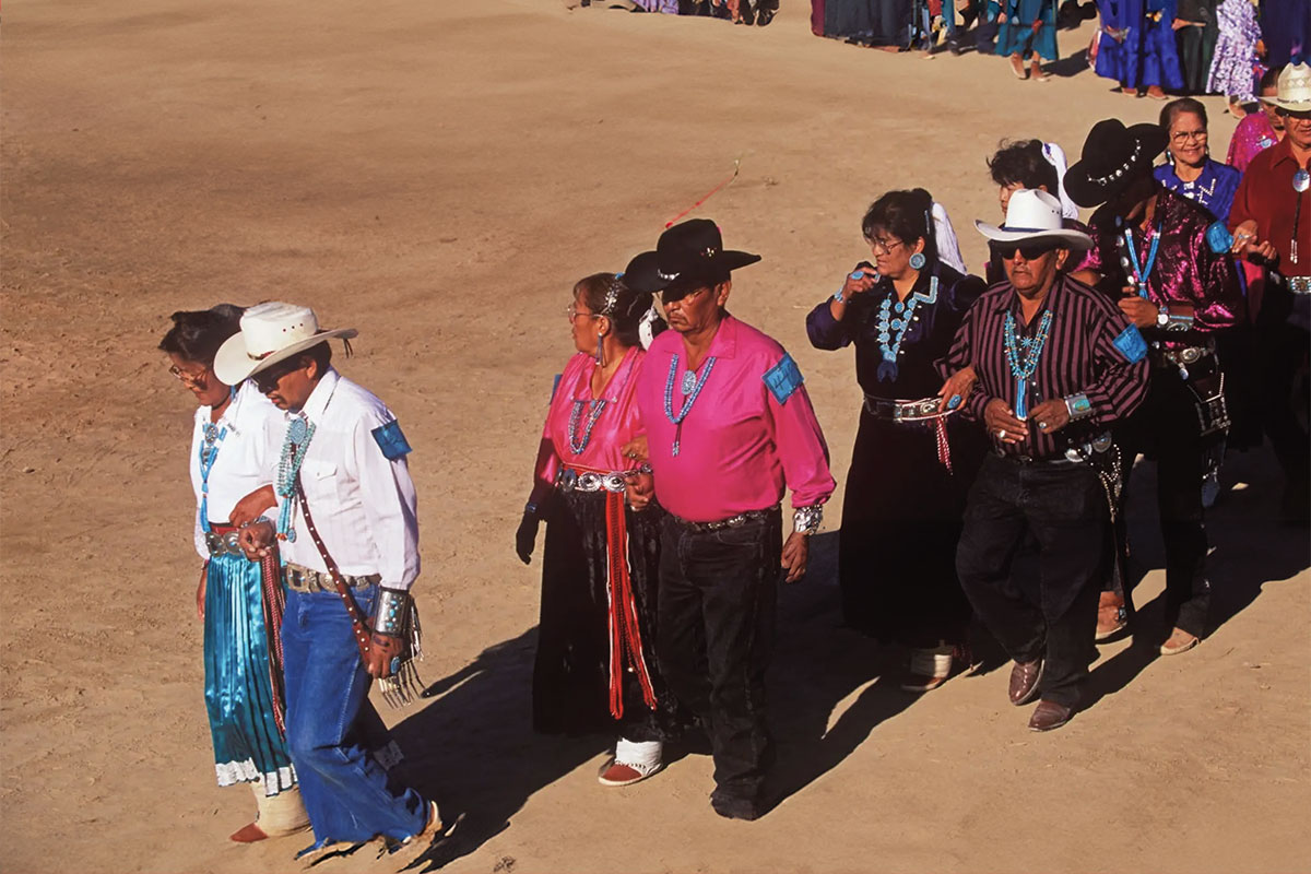 Group of individuals performing at the Navajo Song and Dance