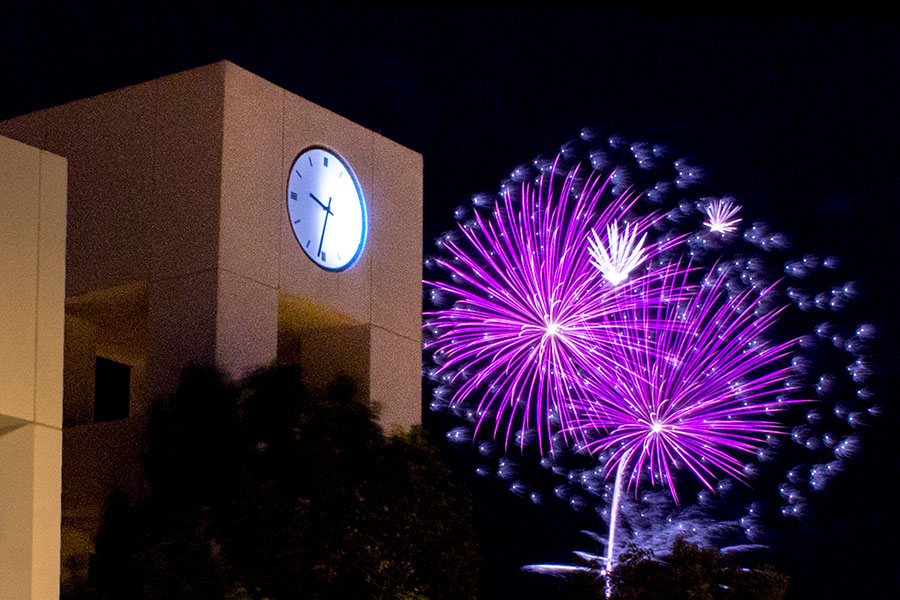 SJC Clocktower and purple fireworks