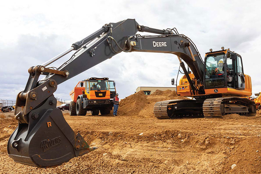 An Individual using heavy equipment at San Juan College